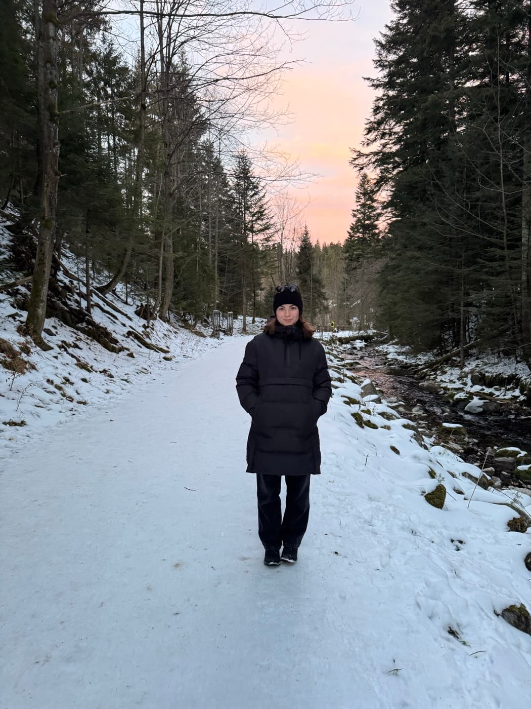 Karolina on a snowy forest trail in the Polish mountains